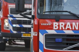 Felle brand in loods van autobedrijf in Roden